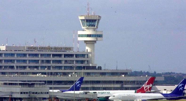 Passenger planes pictured at Murtala Mohammed International Airport in the Nigerian commercial capital Lagos on October 23, 2005