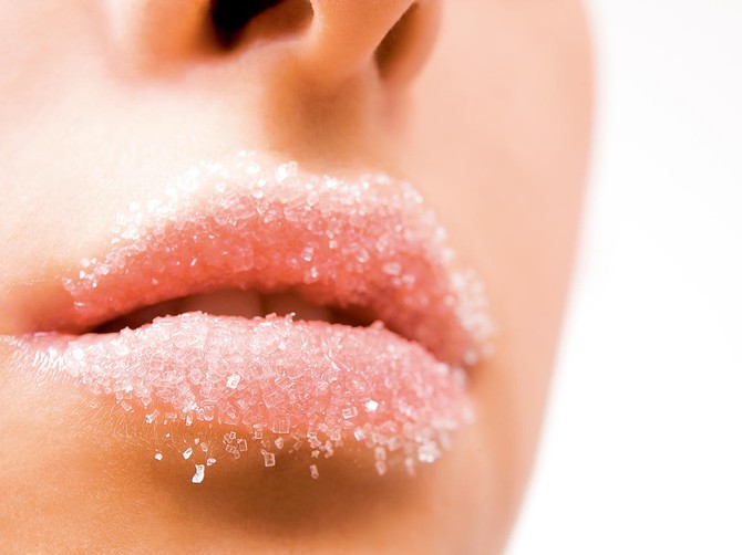 21270_stock-photo-woman-s-red-lips-strewed-with-sugar-shutterstock_18788782