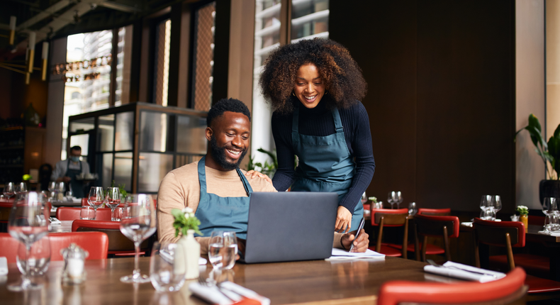 Young couple in their restaurant business