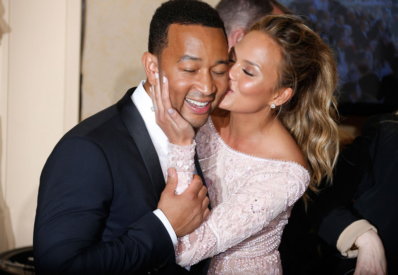 If your partner likes physical touch, you may have to do a lot of it like Chrissy Teigen and John Legend. [Credit Getty] 