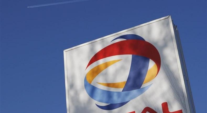 A logo for oil giant Total is seen at a petrol station in London February 12, 2008. REUTERS/Stephen Hird