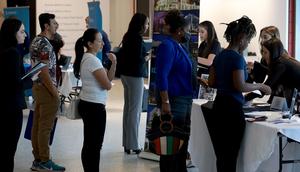 Job seekers are at a job fair in Florida in 2023.Joe Raedle/Getty Images