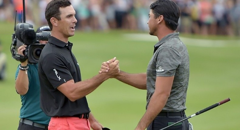 Billy Horschel shakes hands with Jason Day after beating him in a playoff during the Final Round of the Byron Nelson