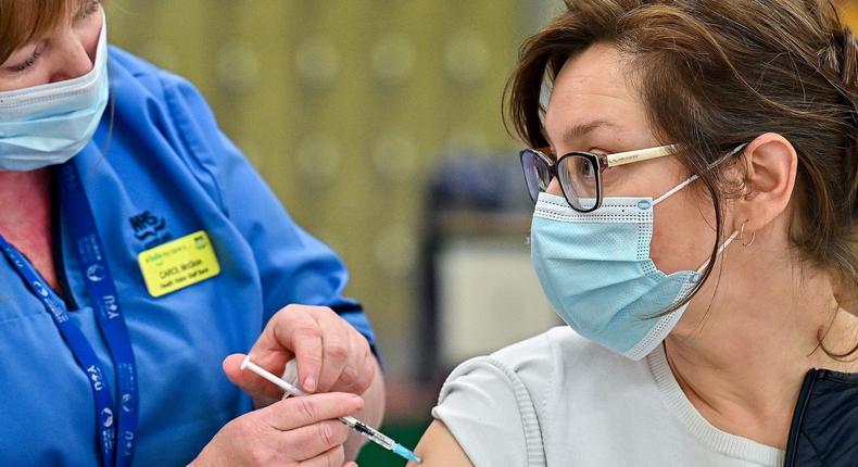 A woman receives a COVID-19 vaccination  in Glasgow, Scotland on May 14, 2021.
