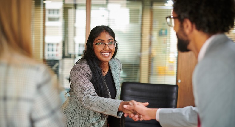 If the hiring manager is too optimistic and full of praise during an interview, it could be a sign of love-bombing.sturti/Getty Images