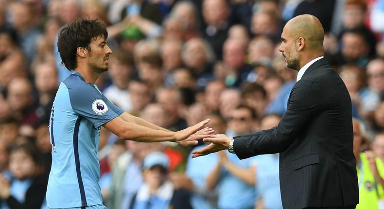 ___5555950___https:______static.pulse.com.gh___webservice___escenic___binary___5555950___2016___10___2___12___david-silva-pep-guardiola-cropped_5wwx3o4cjkta118v98893m7ai