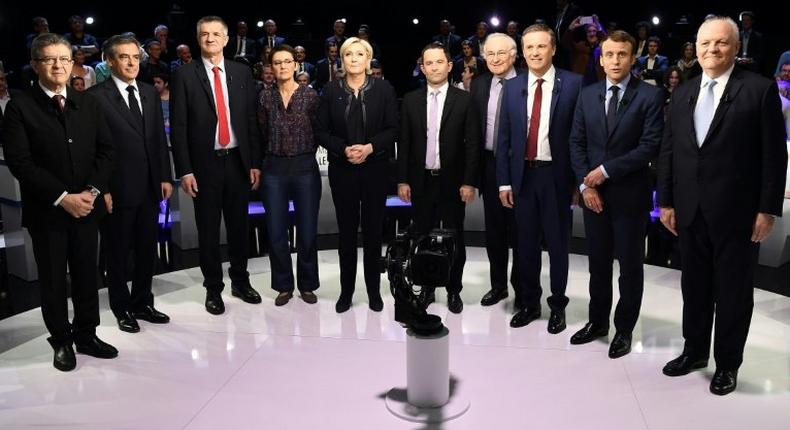 Ten of the eleven candidates before the debate -- autoworker Philippe Poutou refused to take part in the family photo