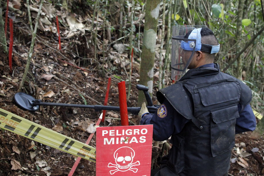 A member of the Humanitarian Demining Battalion of the Colombian Army searches for land mines in Cocorna, Antioquia, March 3, 2015. According to the United Nations Mines Action Service, Colombia has the second-highest number of victims from land mines in the world, after Afghanistan.