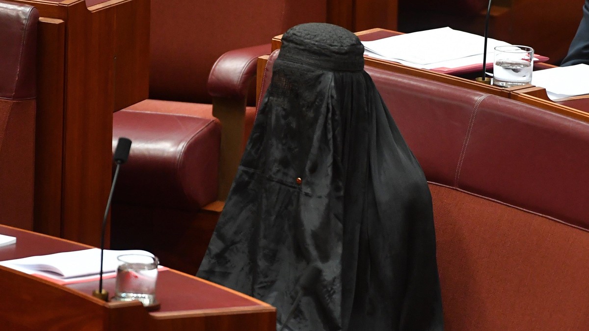 One Nation Leader Senator Pauline Hanson wears a full burqa at Parliament House in Canberra