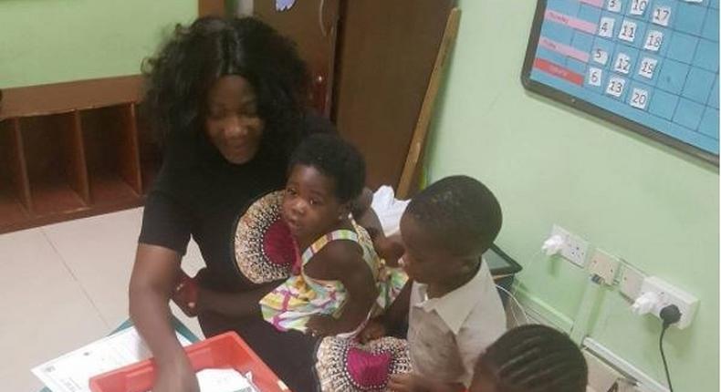 Mercy Johnson at her children's school