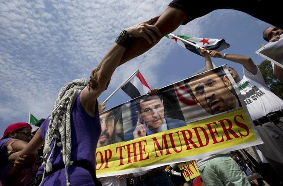 Demonstracije protiv napada na Siriju ispred Bele kuće u Vašingtonu