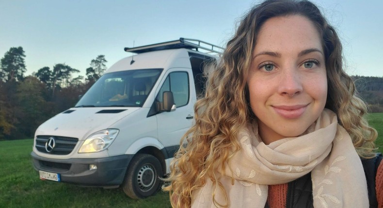 Mariah Arianna standing outside in front of her van.Mariah Arianna