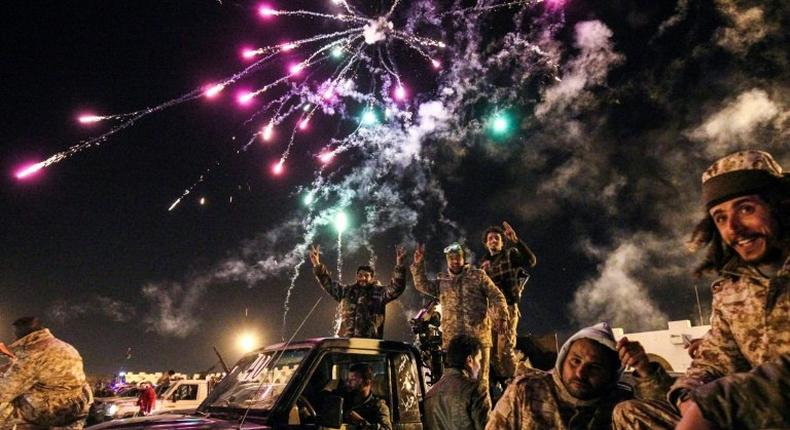 Libyans take part in a celebration with fireworks marking the sixth anniversary of the Libyan revolution, which toppled strongman Moamer Kadhafi, in Benghazi on February 17, 2017