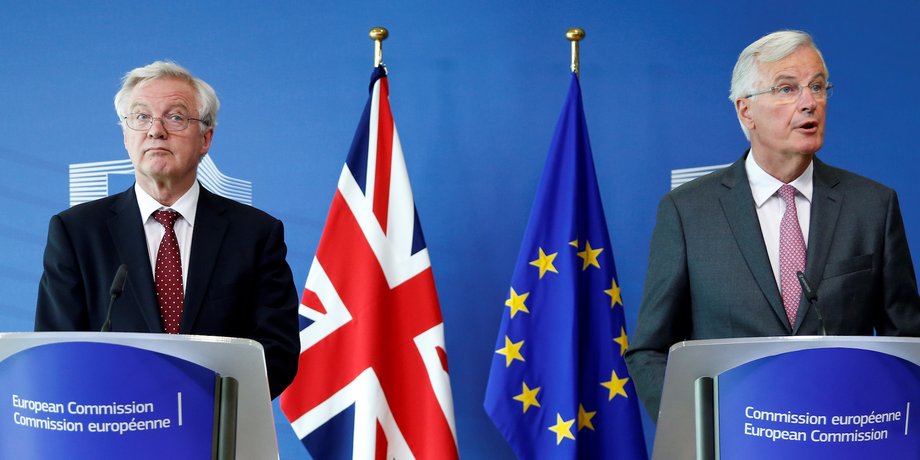 Brexit secretary David Davis (L) with the EU's chief negotiator Michel Barnier