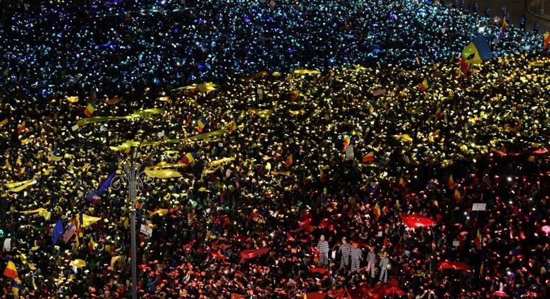 People protest in front of the government headquarters in Bucharest, against the controversial corruption decrees on February 12, 2017