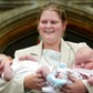 File picture shows the world's first test-tube baby Britain's Brown, facing the media as Professor Edwards looks on, in Cambridgeshire