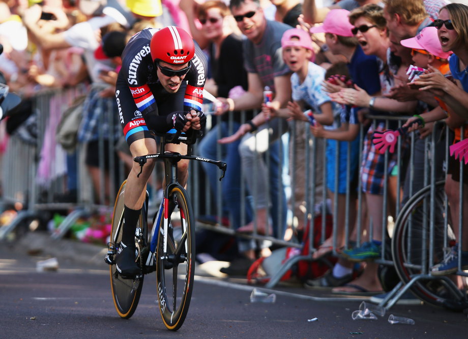 Time-trial specialist Tom Dumoulin of the Netherlands lit up the opening stage, blazing around the 6-mile course in 11 minutes and 3 seconds, with an average speed of 33 mph. He won by one-hundredth of a second.