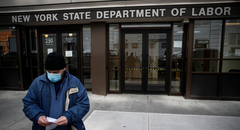 FILE - In this March 18, 2020 file photo, visitors to the Department of Labor are turned away at the door by personnel due to closures over coronavirus concerns. The coronavirus pandemic has already hurt many households financially. Americans have been hit with layoffs, furloughs and reduced hours across the country. Those who have not are still facing massive economic uncertainty. Experts say it's more important than ever to manage your budget, reach out to lenders and seek protections available to those hit by the economic impact of the virus. (AP Photo/John Minchillo, File)