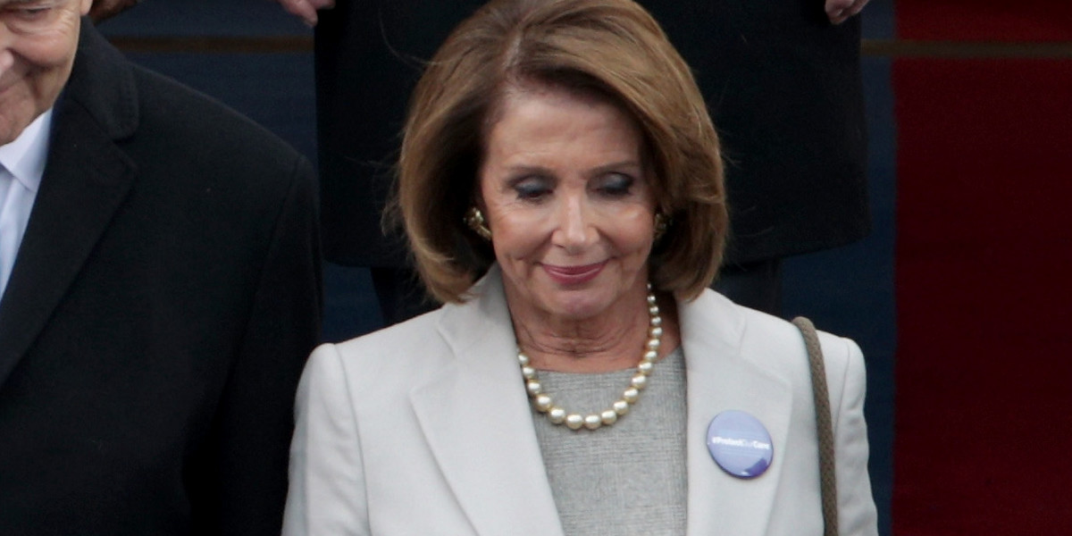 Democrats are wearing 'Protect Our Care' pins at the inauguration to protest the repeal of Obamacare