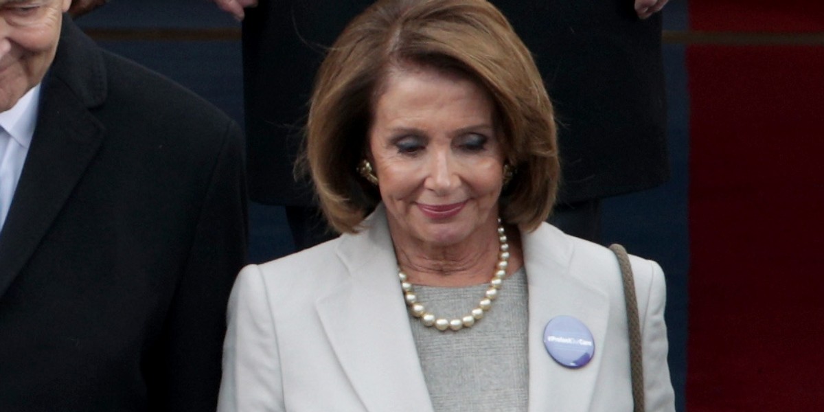 Democrats are wearing 'Protect Our Care' pins at the inauguration to protest the repeal of Obamacare