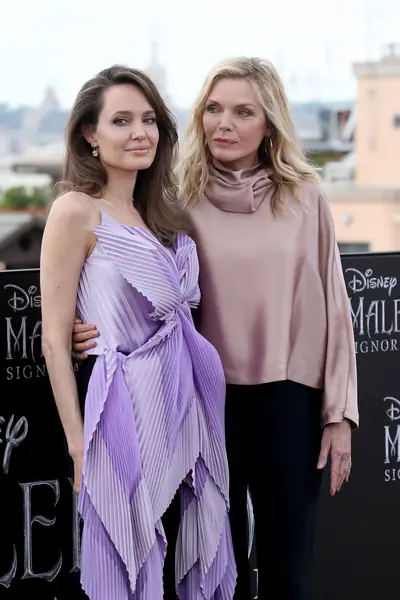 Angelina Jolie i Michelle Pfeiffer na premierze &quot;Czarownicy 2&quot; / Franco Origlia / Getty Images