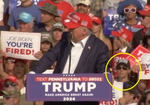 Žena je navodno izvukla telefon u vreme kad je pucano na Trampa