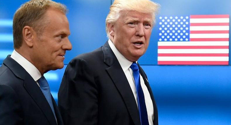 European Council President Donald Tusk welcomes US President Donald Trump at EU headquarters in Brussels on May 25, 2017