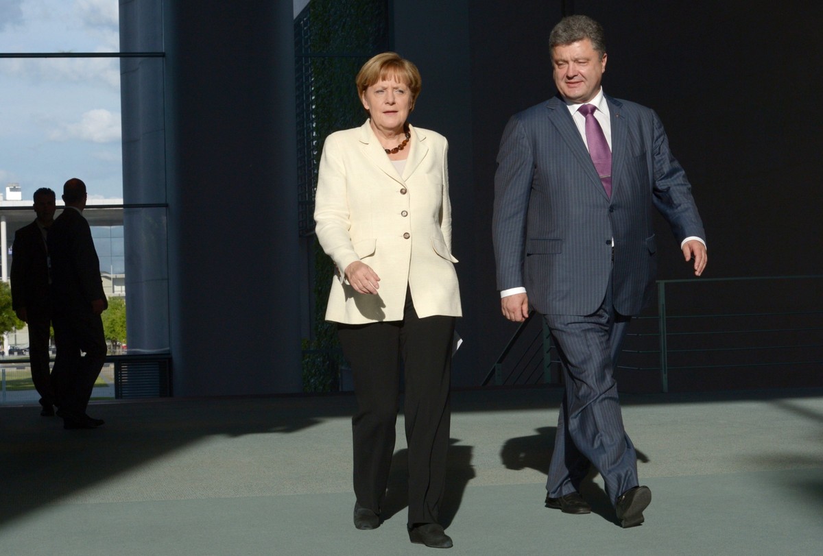 Poroszenko miał spotkać się z Putinem w obecności Angeli Merkel EPA/RAINER JENSEN
