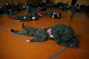 Przybyl checks breath as he takes part in a medical course organised by paramilitary organisation called Obrona Narodowa (National Defence) in Mrozy
