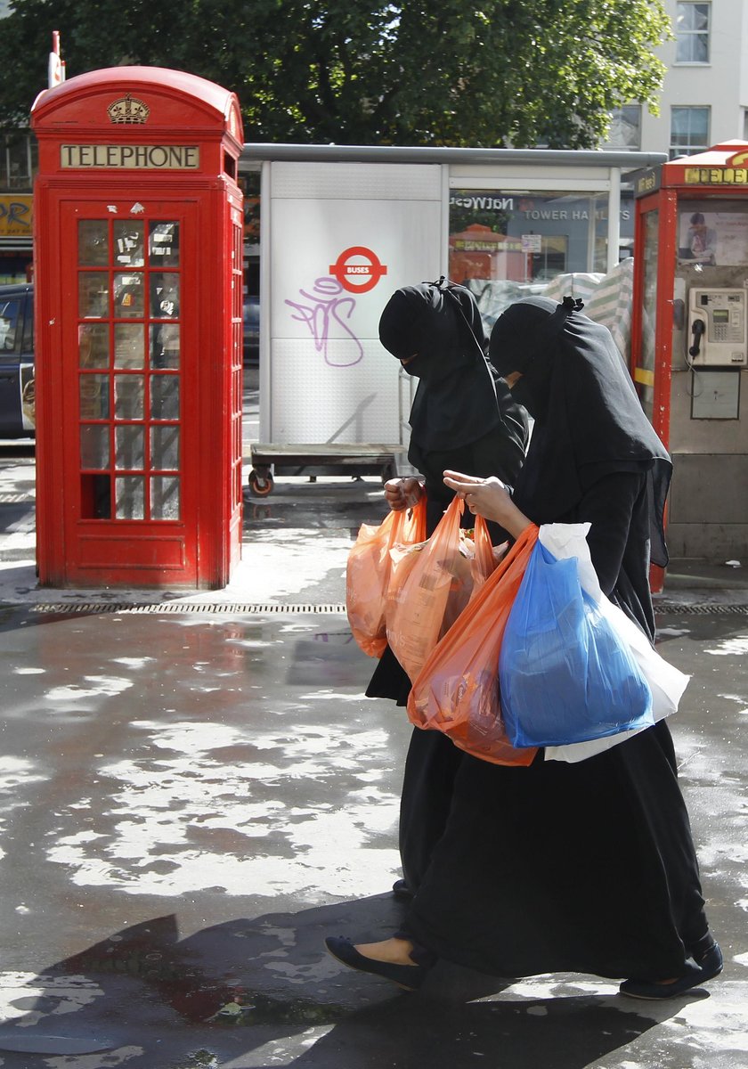 File photograph of women wearing full-face veils as they shop in London