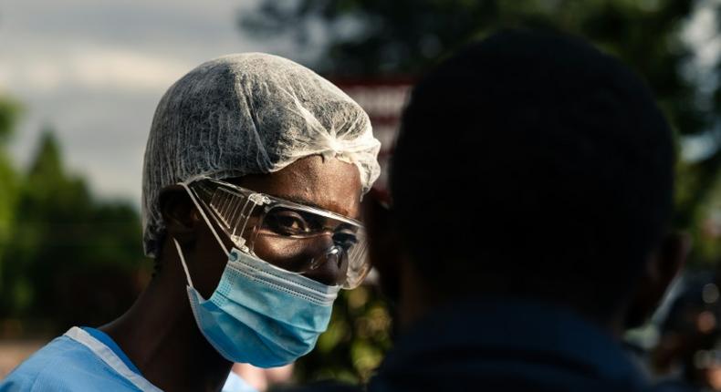 Doctors and nurses in Zimbabwe staged a walk-out in protest over a lack of protective clothing