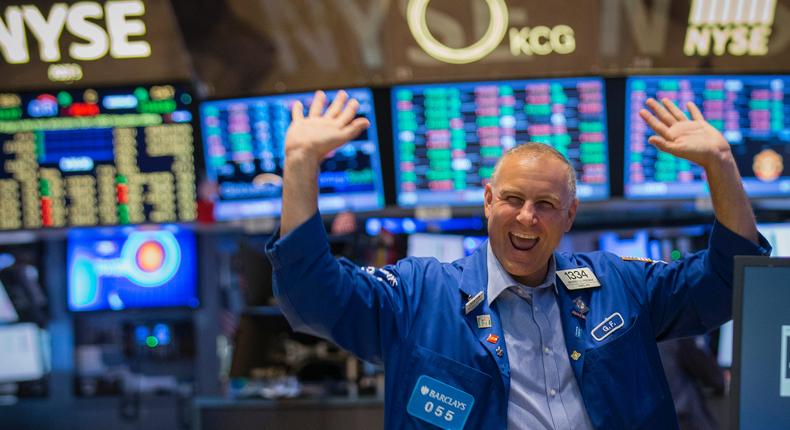 Specialist Geoffrey Friedman reacts to the Dow Jones industrials average passing 17,000 on the floor of the New York Stock Exchange July 3, 2014.REUTERS/Brendan McDermid