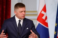 Slovakian Prime Minister Robert Fico gestures as he attends a joint news conference with the French President at the Elysee Palace in Paris