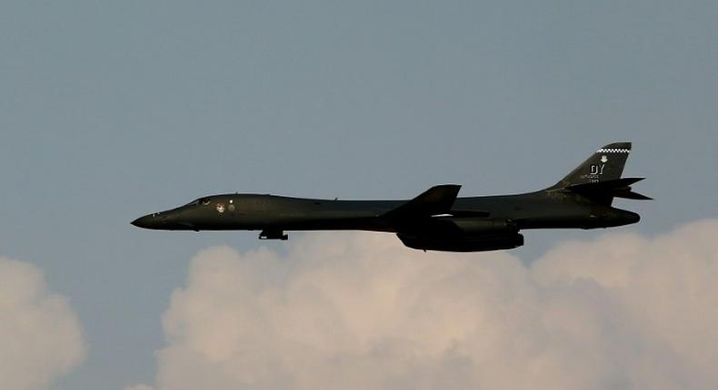A US B1-B bomber and two F-15 fighters with the Japan Air Self-Defense Force flew over the neighbouring East China Sea, the US Pacific Air Forces Public Affairs office said