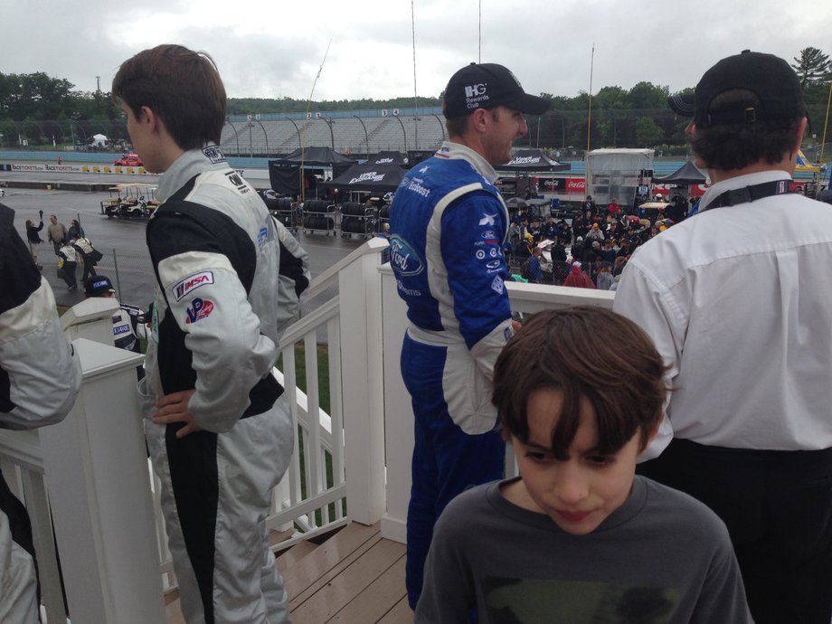 After the race, James found himself surrounded by guys in racing suits, discussing how they had done.