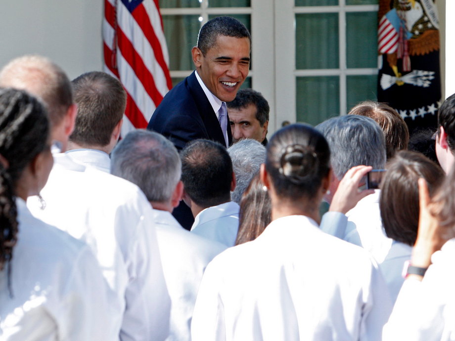 U.S. President Barack Obama greets doctors from across the country after making remarks on the need for health insurance reform in the Rose Garden at the White House in Washington, October 5, 2009.