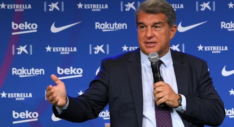 Joan Laporta said Barcelona were working to persuade Lionel Messi to stay as the club introduced Eric Garcia