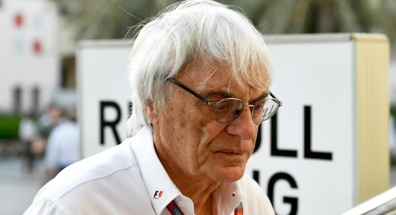 Former Formula One boss Bernie Ecclestone looks on in the paddock ahead of the Formula One Bahrain Grand Prix at the Sakhir circuit in the desert south of the Bahrain's capital, Manama, on April 14, 2017