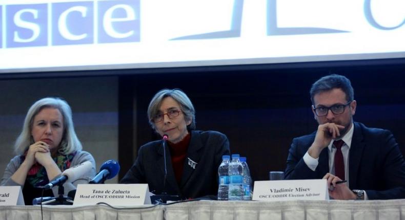 Tana de Zulueta (C), head of the OSCE's Office for Democratic Institutions and Human Rights speaks next to her deputy Meaghan Fitzgerald (L) and election advisor Vladimir Misev (R) March 17, 2017 to launch a limited observation mission in Turkey