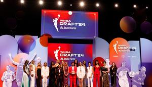 WNBA Commissioner Cathy Engelbert poses with future draftees before the 2024 WNBA Draft.Sarah Stier/Staff/Getty Images