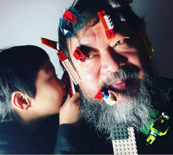 Dissident Chinese artist Ai Weiwei is seen with Lego bricks on his face in this undated image taken 