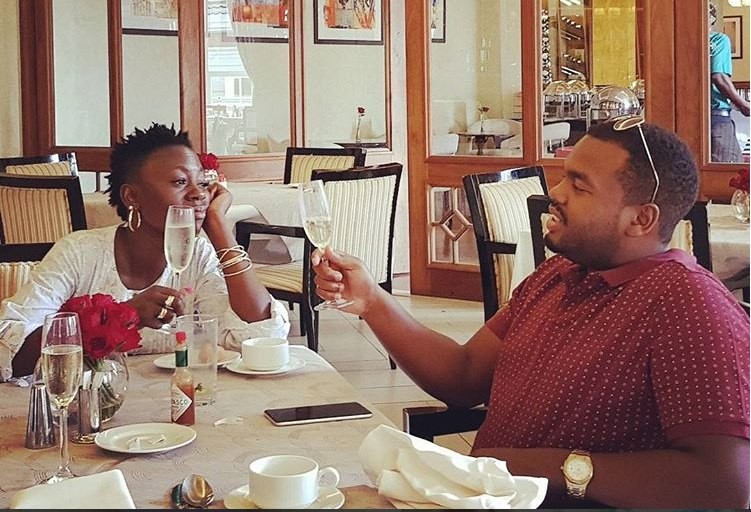 Singer Akothee with her manager Nelly Oaks. 