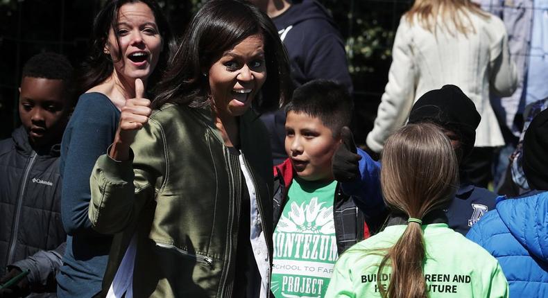 Michelle Obama at the white house kitchen garden planting