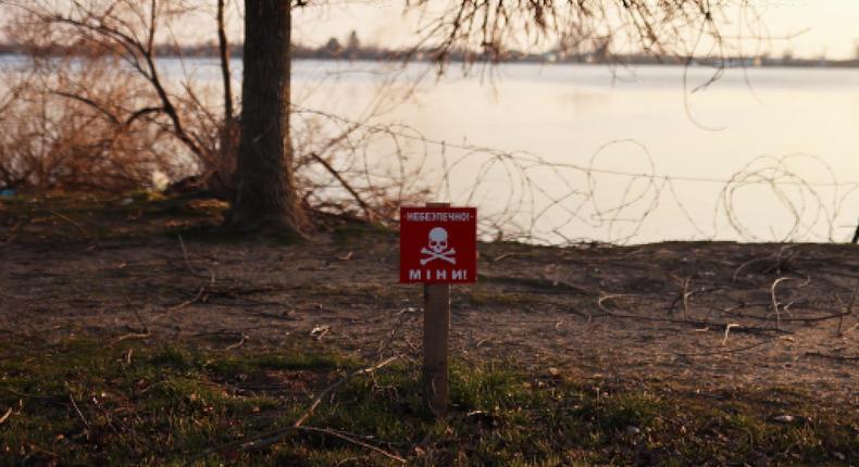 A mine danger sign by the Dnipro River in Kherson, Ukraine on January 25, 2023.REUTERS/Nacho Doce