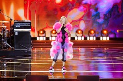 Majka Jeżowska jako warszawska Syrenka. W teatrze