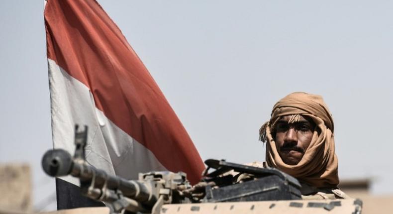 An Iraqi forces member is seen patrolling the area of the industrial zone in Mosul on June 23, 2017