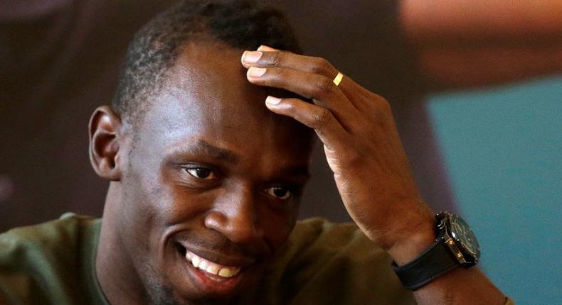 Jamaican sprinter Usain Bolt reacts during a news conference before the Ostrava Golden Spike athletics meeting, in Prague, Czech Republic, May 18, 2016. 