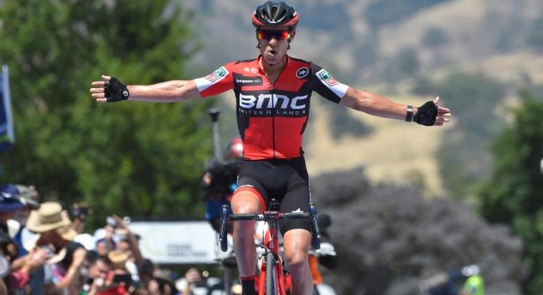 Australian cyclist Richie Porte from Team BMC celebrates after winning the second stage of the Tour Down Under, from Stirling to Paracombe, on January 18, 2017