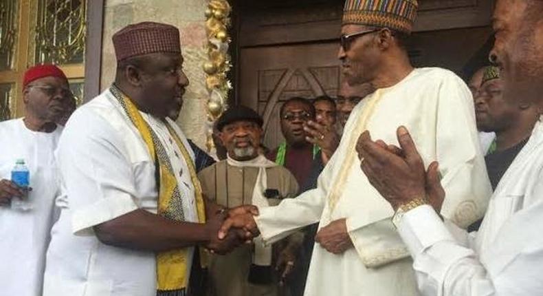 Rochas Okorocha shakes President Muhammadu Buhari (PM News)