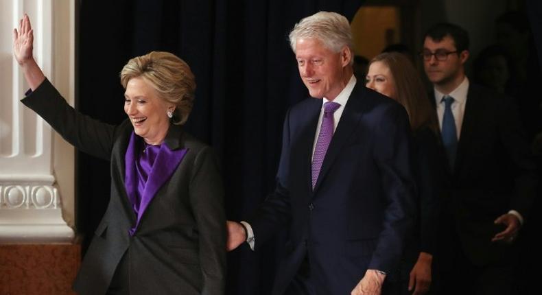 Former Secretary of State Hillary Clinton, accompanied by her husband former President Bill Clinton, takes the stage to concede the presidential election at the New Yorker Hotel on November 9, 2016 in New York City